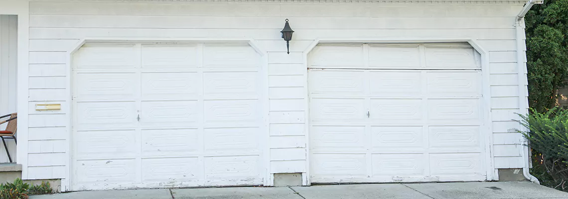 Roller Garage Door Dropped Down Replacement in St Petersburg, FL